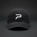PRIME black cap, white embroidered P — front view